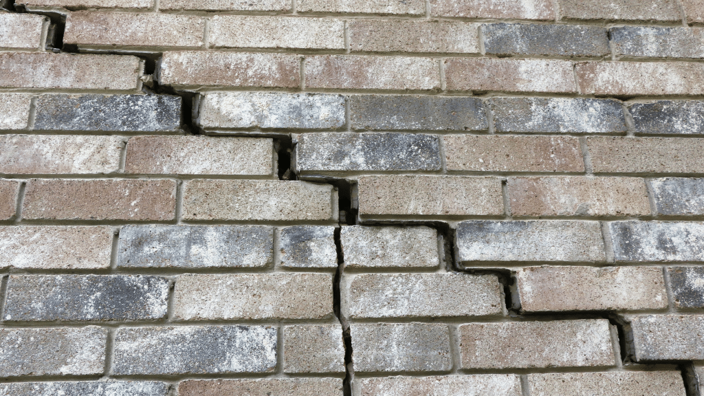 cracks on the brick facade