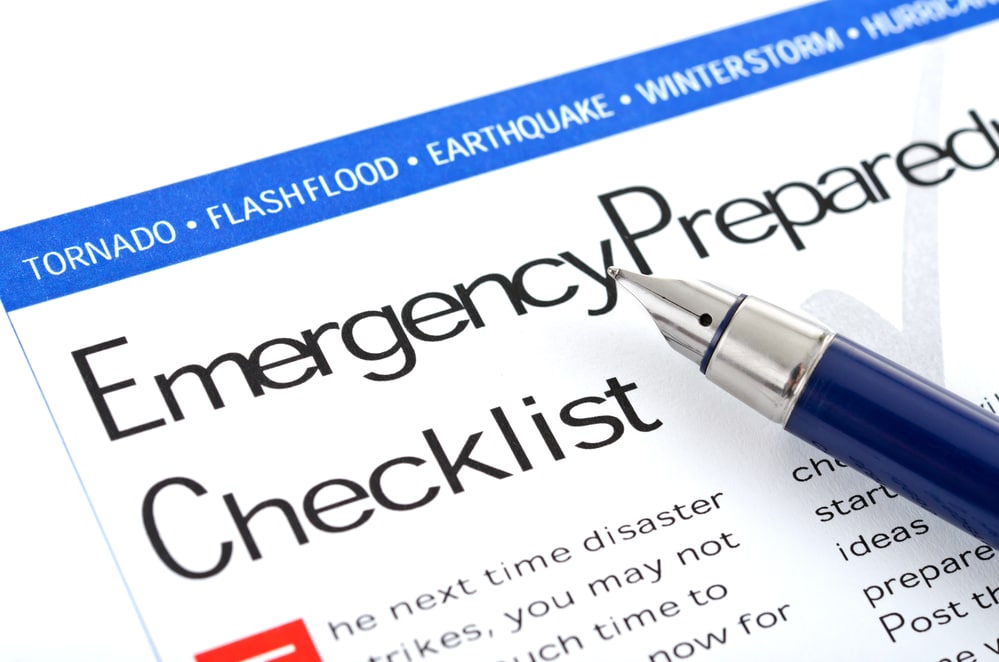 fountain pen lying on " Emergency Preparedness Checklist " form